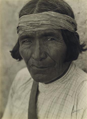 EDWARD S. CURTIS (1868-1952) A group of 12 signed silver prints, including portraits, studies of the Hupa fishermen, and numerous publi